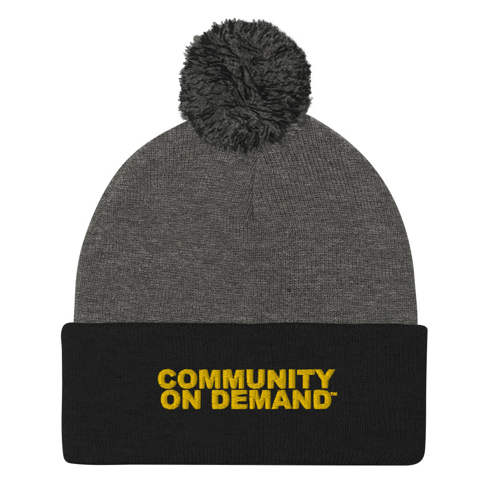Community On Demand Pom-Pom Beanie