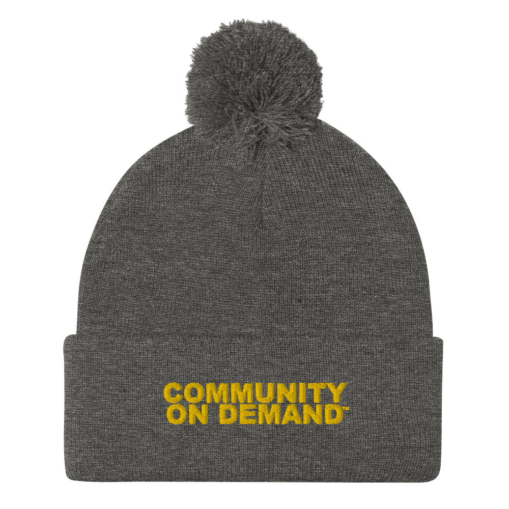 Community On Demand Pom-Pom Beanie